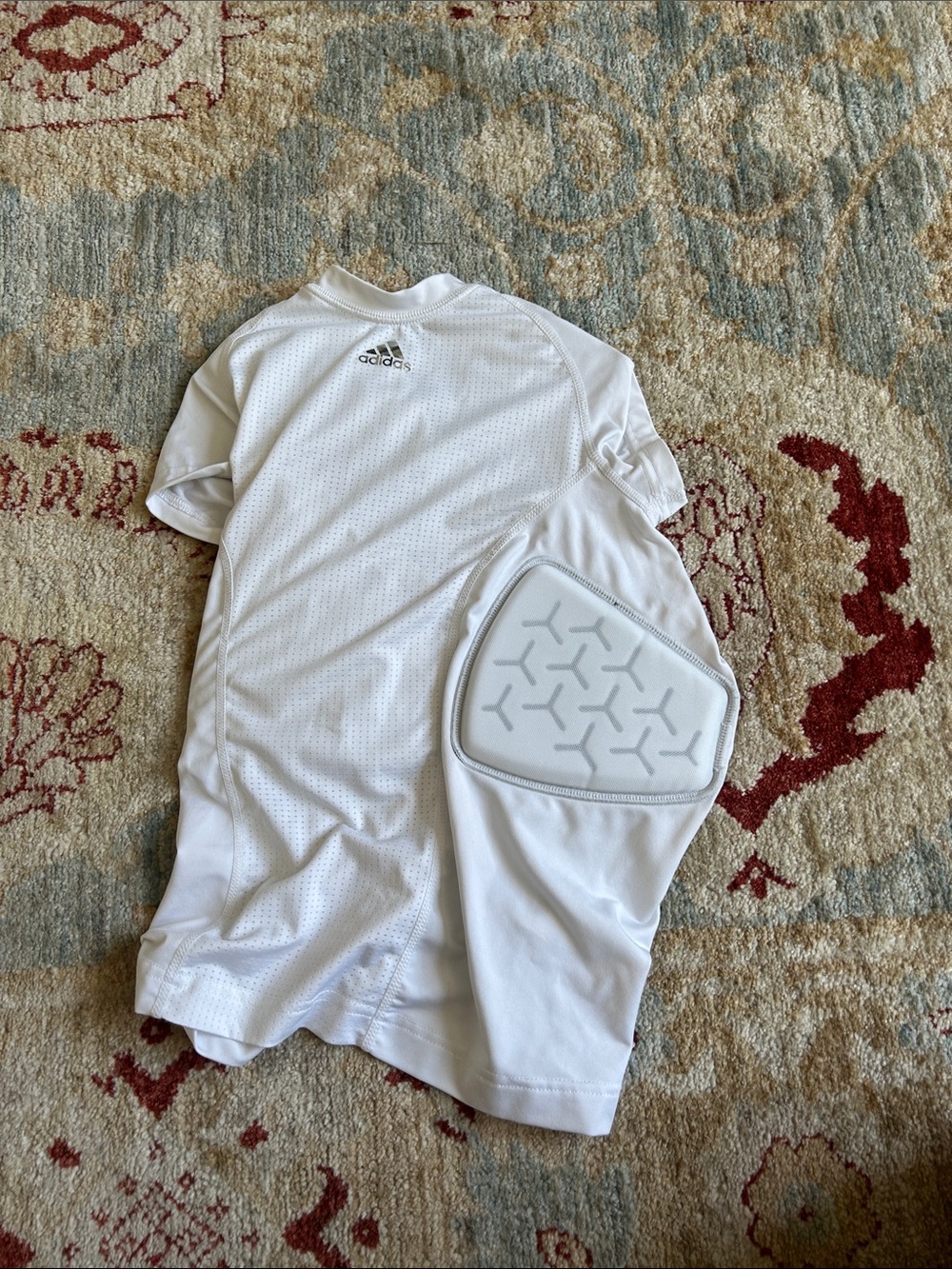 adidas White Padded Athletic Top
Football or lacrosse